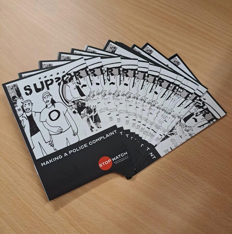 Photo of several copies of the A6 complaints guide